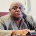 NEC Chairman Jonathan K. Weedor speaks about recent staff reassignments at the National Elections Commission in Monrovia.