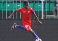 Liberia captain Oscar Dorley in action during a football match for the Lone Star national team.