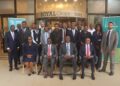 Central Bank of Liberia Governor Henry Saamoi and banking stakeholders participate in a seminar on cross-border payment systems and correspondent banking in Monrovia.