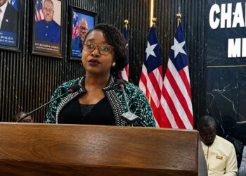 NPHIL Interim Director General Dr. Sia Wata Camanor addresses a press briefing on Liberia's Ebola preparedness and public health surveillance measures.