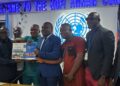 Central Bank of Liberia Governor Henry Saamoi and banking stakeholders participate in a seminar on cross-border payment systems and correspondent banking in Monrovia.