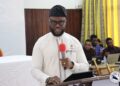 Civil Service Agency Director-General Dr. Josiah Joekai Jr. speaks at a constitutional reform dialogue in Monrovia, advocating major changes to Liberia's Constitution.