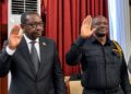 Justice Minister Oswald Tweh addresses lawmakers during a hearing on the US$19.2 million cocaine investigation at the Capitol Building.