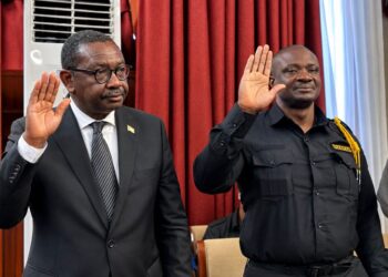 Justice Minister Oswald Tweh addresses lawmakers during a hearing on the US$19.2 million cocaine investigation at the Capitol Building.