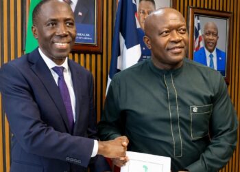 Liberian and African Development Bank officials sign a US$16.7 million economic reform agreement in Monrovia.