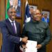Liberian and African Development Bank officials sign a US$16.7 million economic reform agreement in Monrovia.
