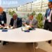 Finance Minister Augustine Ngafuan and BADEA President Abdullah Almusaibeeh sign a $30 million agreement for the Salayea-Konia road project in Vienna