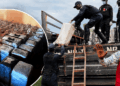 Liberian security officers remove suspected cocaine from a warehouse during a raid in Duazon, Margibi County.
