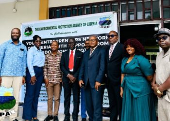 EPA Executive Director Dr. Emmanuel King Urey Yarkpawolo addresses participants at the MSME climate resilience workshop in Monrovia.