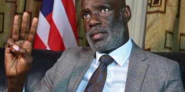 Former presidential Chief of Office Staff Eugene Lenn Nagbe discussing Liberia's cocaine trafficking cases during a radio interview.