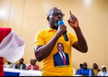 Grand Gedeh District #1 Representative Jeremiah Garwo Sokan presents his legislative report while announcing a L$10 million interest-free loan fund in Zwedru.