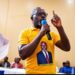 Grand Gedeh District #1 Representative Jeremiah Garwo Sokan presents his legislative report while announcing a L$10 million interest-free loan fund in Zwedru.