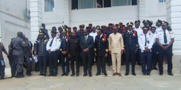 Lofa County Senator Momo T. Cyrus addresses graduates of the Liberia National Police Academy during the Fire Service and LPRC graduation ceremony.