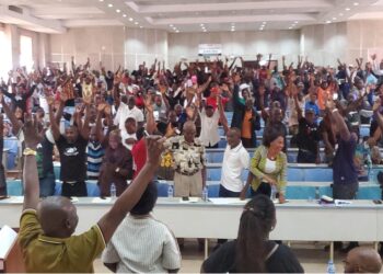 Faculty and staff gather during the University of Liberia General Assembly that voted to shut down campuses and pass a vote of no confidence.