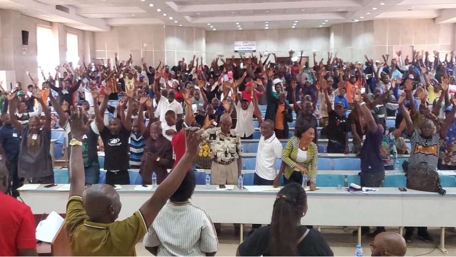 Faculty and staff gather during the University of Liberia General Assembly that voted to shut down campuses and pass a vote of no confidence.