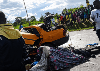 Wreckage of two taxis after a fatal head-on collision on the Suakoko Highway in Bong County that killed four people and critically injured six others.