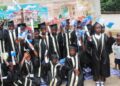 Graduates of Yarkpawolo Public School celebrate during their graduation ceremony in Gomue Town, Bong County.