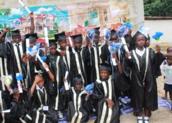 Graduates of Yarkpawolo Public School celebrate during their graduation ceremony in Gomue Town, Bong County.