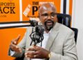 Public Works Minister Roland Lafayette Giddings discussing Liberia's road infrastructure and the National Road Fund.