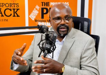 Public Works Minister Roland Lafayette Giddings discussing Liberia's road infrastructure and the National Road Fund.