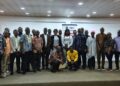 Officials and stakeholders attend the National Elections Commission's consultation on its Communications Strategy in Monrovia.