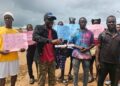 Youth protesters in Neezoe Community demonstrating against Representative Sumo K. Mulbah over a leadership dispute.