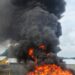 Liberian security officials oversee the destruction of seized cocaine at the LMHRA waste disposal site in Margibi County.