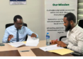 Officials sign the construction contract for the Liberia Packaging Solutions Center.