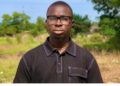University of Liberia engineering student James D. Wuelleh, founder of the Lifeline Empowerment Foundation Vocational Training Institute, poses with students during a vocational training session.
