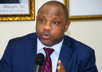 Former Finance Minister Samuel D. Tweah speaking during the CDC anniversary celebration where he commented on President Boakai's appointment of Abrah Kromah.