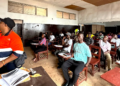Residents of Grand Bassa County participate in ArcelorMittal Liberia's Learning Ability Battery assessment for employment opportunities.