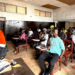 Residents of Grand Bassa County participate in ArcelorMittal Liberia's Learning Ability Battery assessment for employment opportunities.
