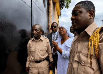 Former Chief of Protocol Nora Finda Bundoo arriving at the Monrovia Central Prison after surrendering to authorities.