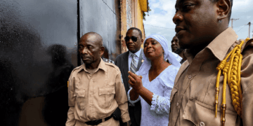 Former Chief of Protocol Nora Finda Bundoo arriving at the Monrovia Central Prison after surrendering to authorities.