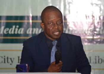 President of the Publishers Association of Liberia, Alphanso Toweh, addressing media debt payments.