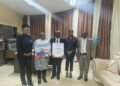 Sen. Prince K. Moye receives an appreciation award from the National Association of Public Defenders of Liberia after securing a historic budget allocation.