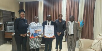 Sen. Prince K. Moye receives an appreciation award from the National Association of Public Defenders of Liberia after securing a historic budget allocation.