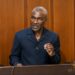 Alexander B. Cummings speaks during a press conference calling for an international investigation into Liberia's US$19.2 million cocaine seizure.