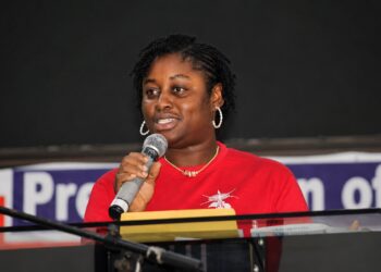 Former Liberia Broadcasting System Director General Estelle Konokpah Liberty at her agribusiness, where she processes locally sourced agricultural products.