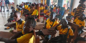 Students and staff at Arena Recreation Academy School of Excellence during a fundraiser in Lower Virginia, Montserrado County.