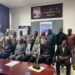 Civil Service Agency Director-General Josiah F. Joekai Jr. and Information Minister Jerolinmek Matthew Piah launch the CSA monthly e-newsletter in Monrovia.