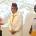 Officials of the Liberia National Handball Association honor Morocco's Ambassador Lahoucine Rahmouni during the Kingdom of Morocco's Throne Day celebration.