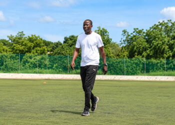 Tapha Manneh walking on the field