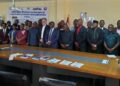 Government officials, civil society representatives and development partners attend a dialogue on local governance and county development in Liberia.