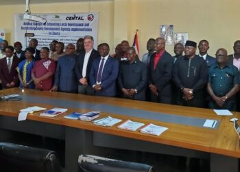 Government officials, civil society representatives and development partners attend a dialogue on local governance and county development in Liberia.