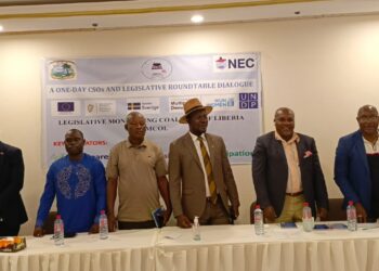 Civil society representatives present the Legislative Monitoring Coalition of Liberia's second-quarter report in Monrovia.