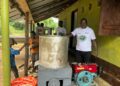 SCNL officials, partners and community members commission a cassava processing facility in Fornor, Porkpa District.