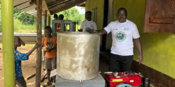 SCNL officials, partners and community members commission a cassava processing facility in Fornor, Porkpa District.