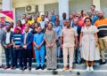 ArcelorMittal Liberia scholarship recipients pose with company executives and government officials during the 2026 scholarship award ceremony in Monrovia.