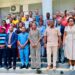 ArcelorMittal Liberia scholarship recipients pose with company executives and government officials during the 2026 scholarship award ceremony in Monrovia.